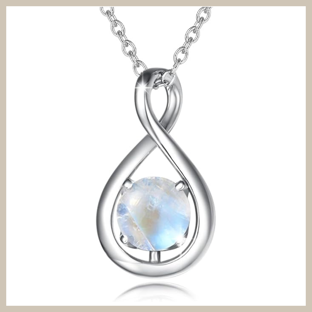 Infinity-shaped 925 sterling silver pendant with a round moonstone suspended at the base, set on a sterling silver cable chain.